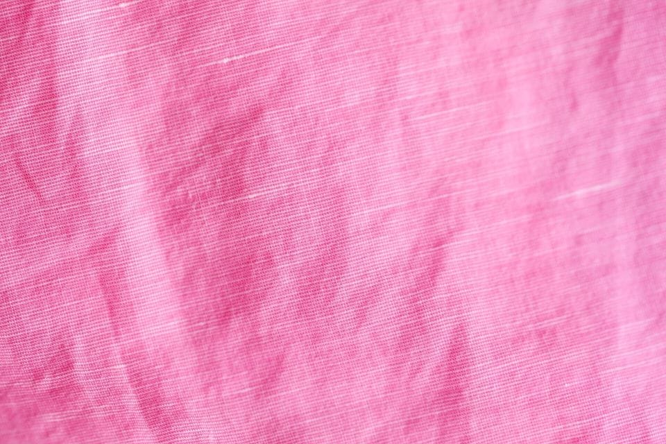 Pink cotton fabric with a fine slub weave